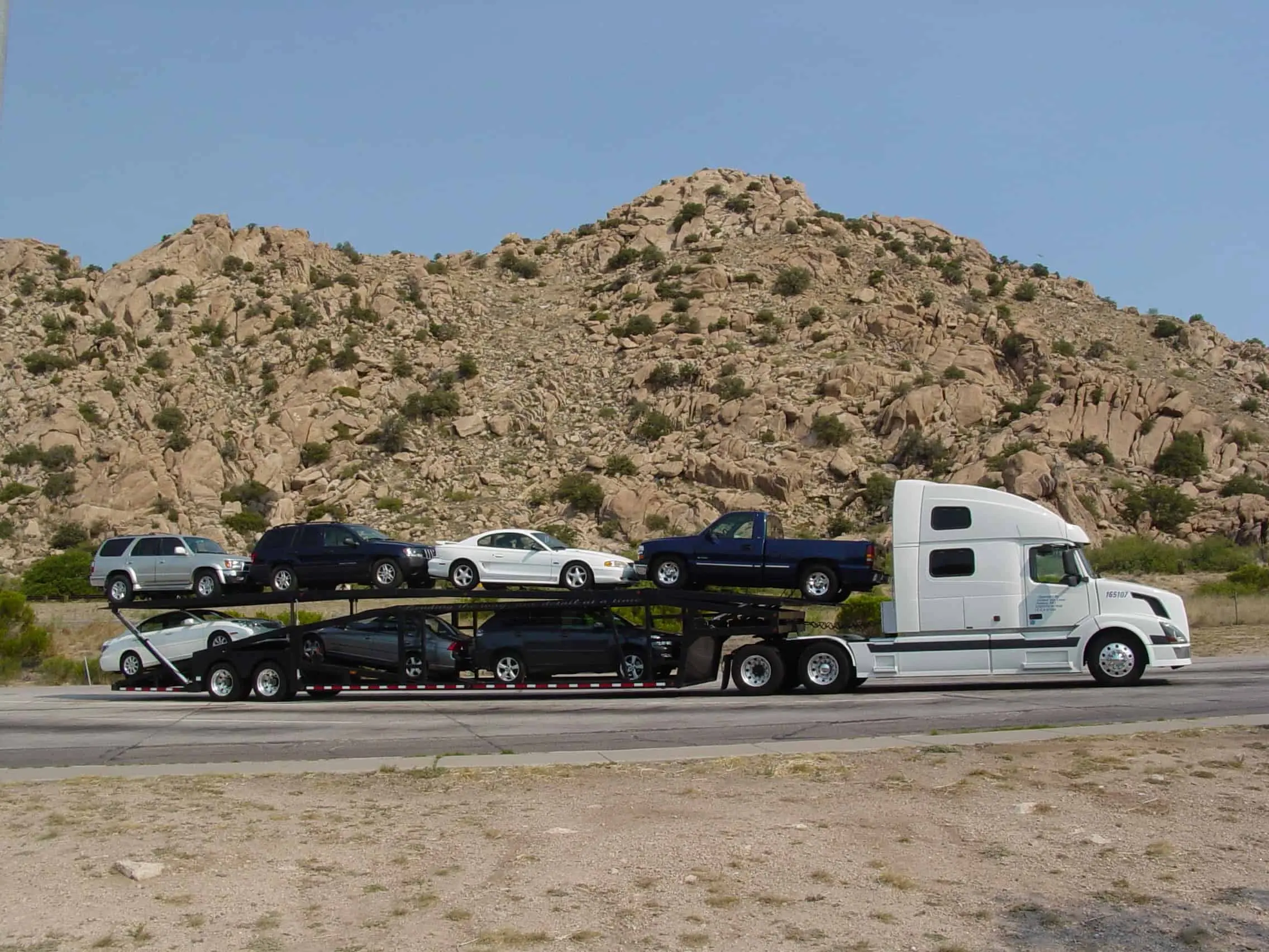Car Shipping - truck with a trailer full of cars - United Van Lines