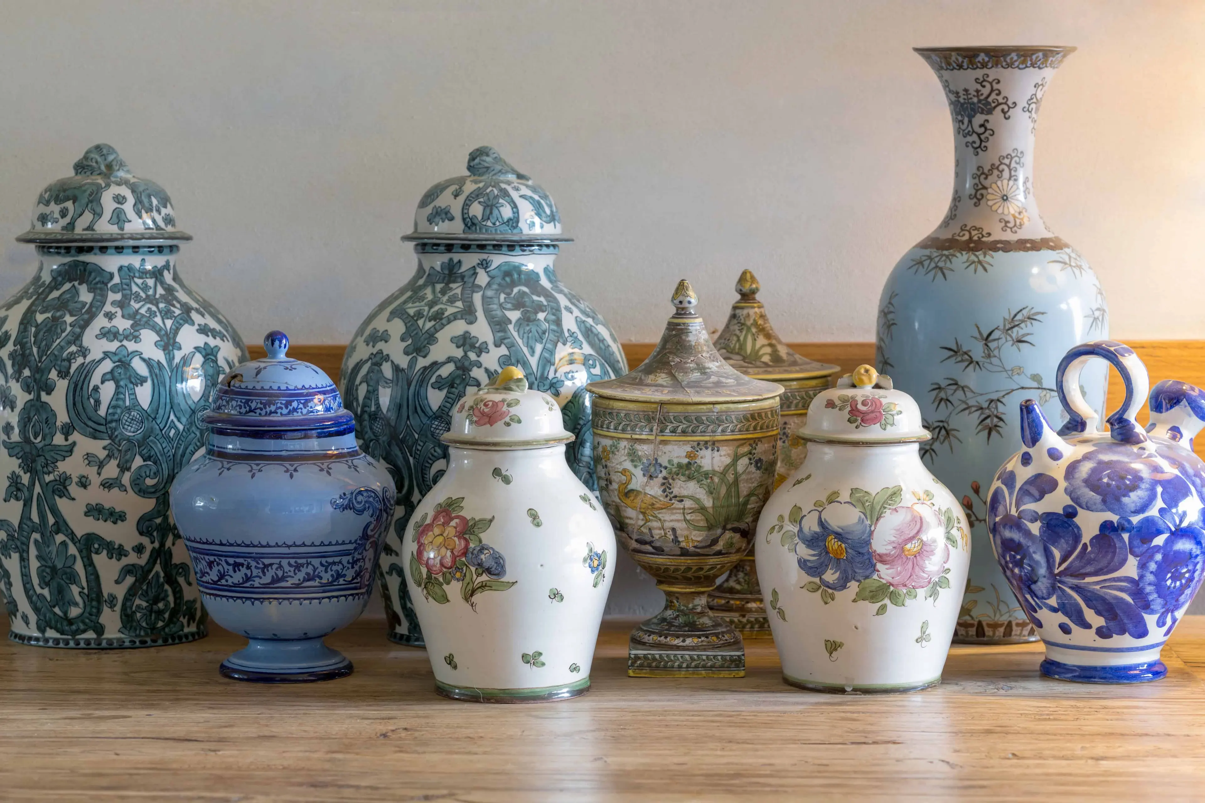 How to Move Antiques - European and chinese antique vase on wooden table- United Van Lines