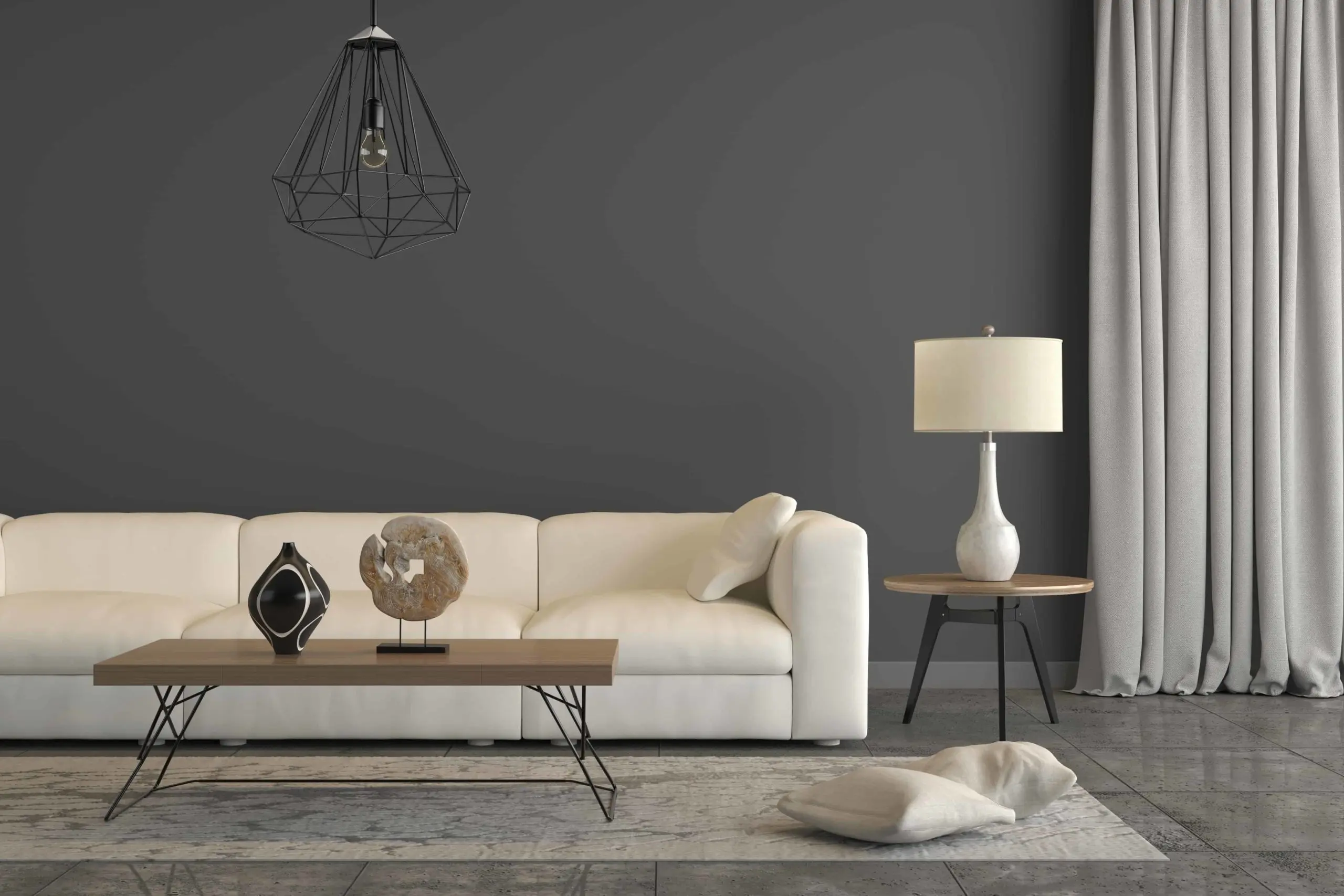 How to Pack Lampshades for Moving - Horizontal composition showing a detail of a minimalist sofa with living room setup around it. There is a table with decorative pieces, pillows, a carpet, a lampa and a curtain. Design is modern and minimalist. Gray wall behind makes it feel intimate. 3D render- United Van Lines