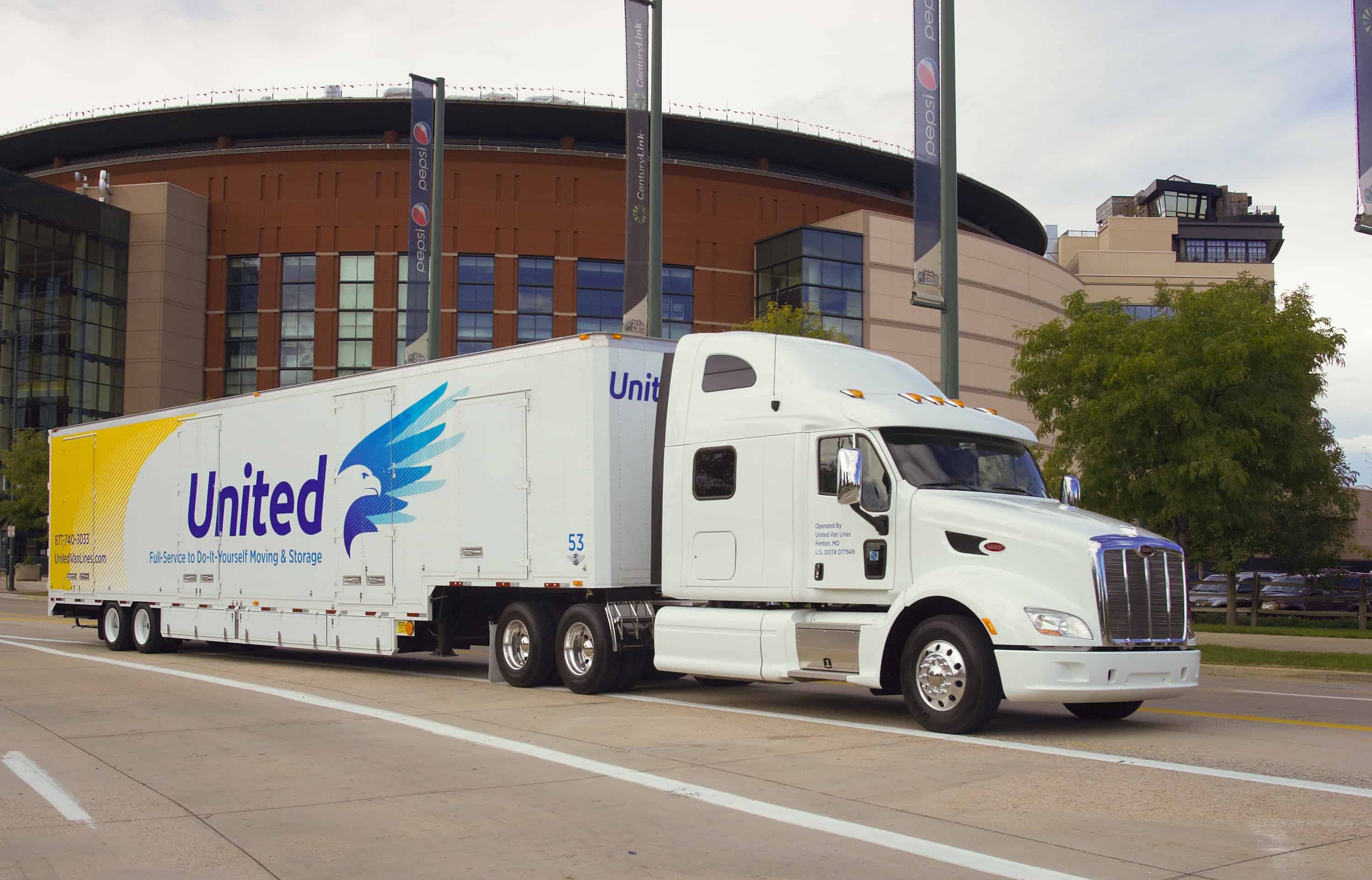 United Van Lines truck driving downtown past the Pepsi Center - United Van Lines®